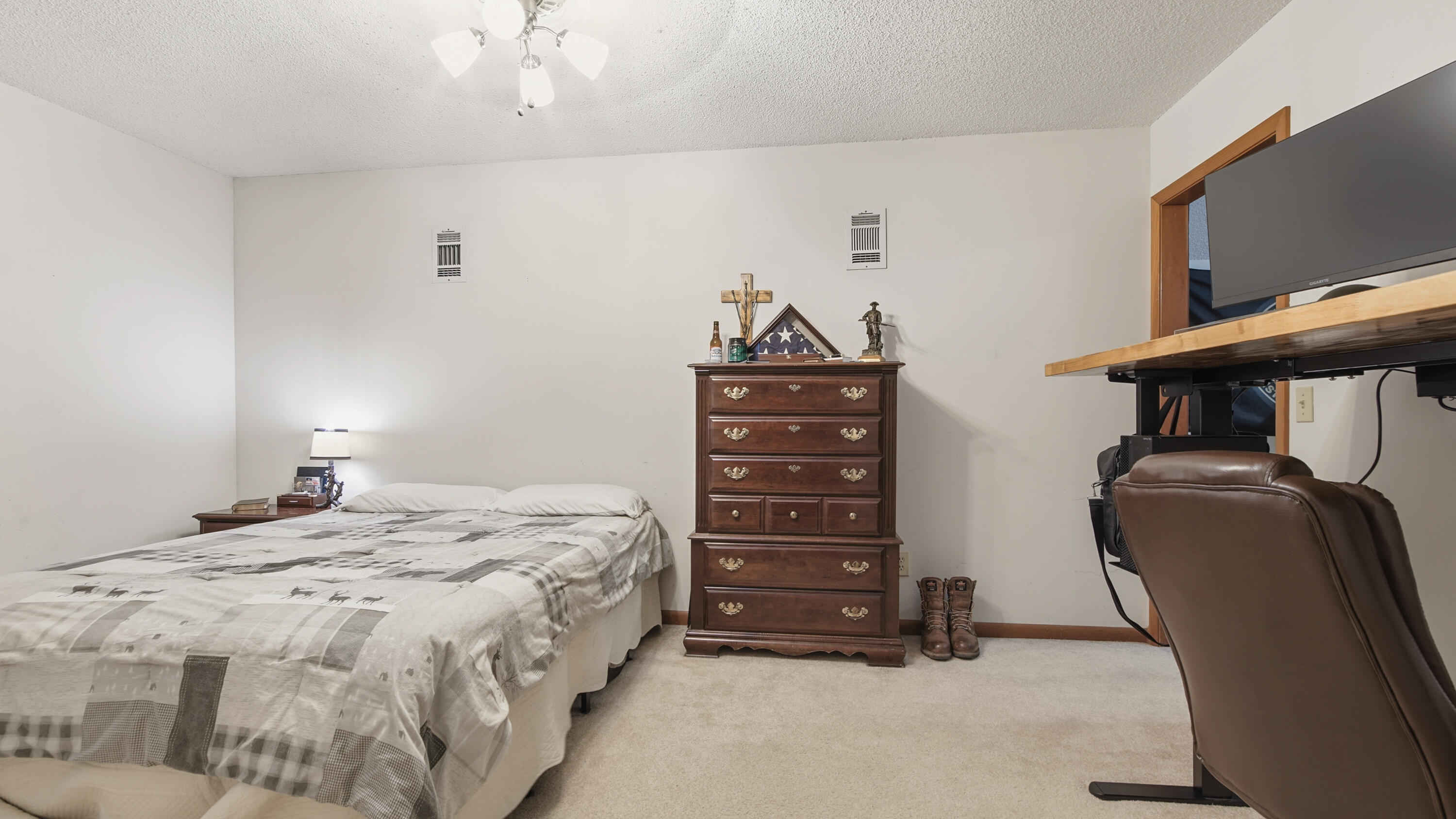 2186 Highway 90 DeFuniak Springs, FL 32433 - Photo 34 of 49 a bedroom with a bed and a flat screen tv