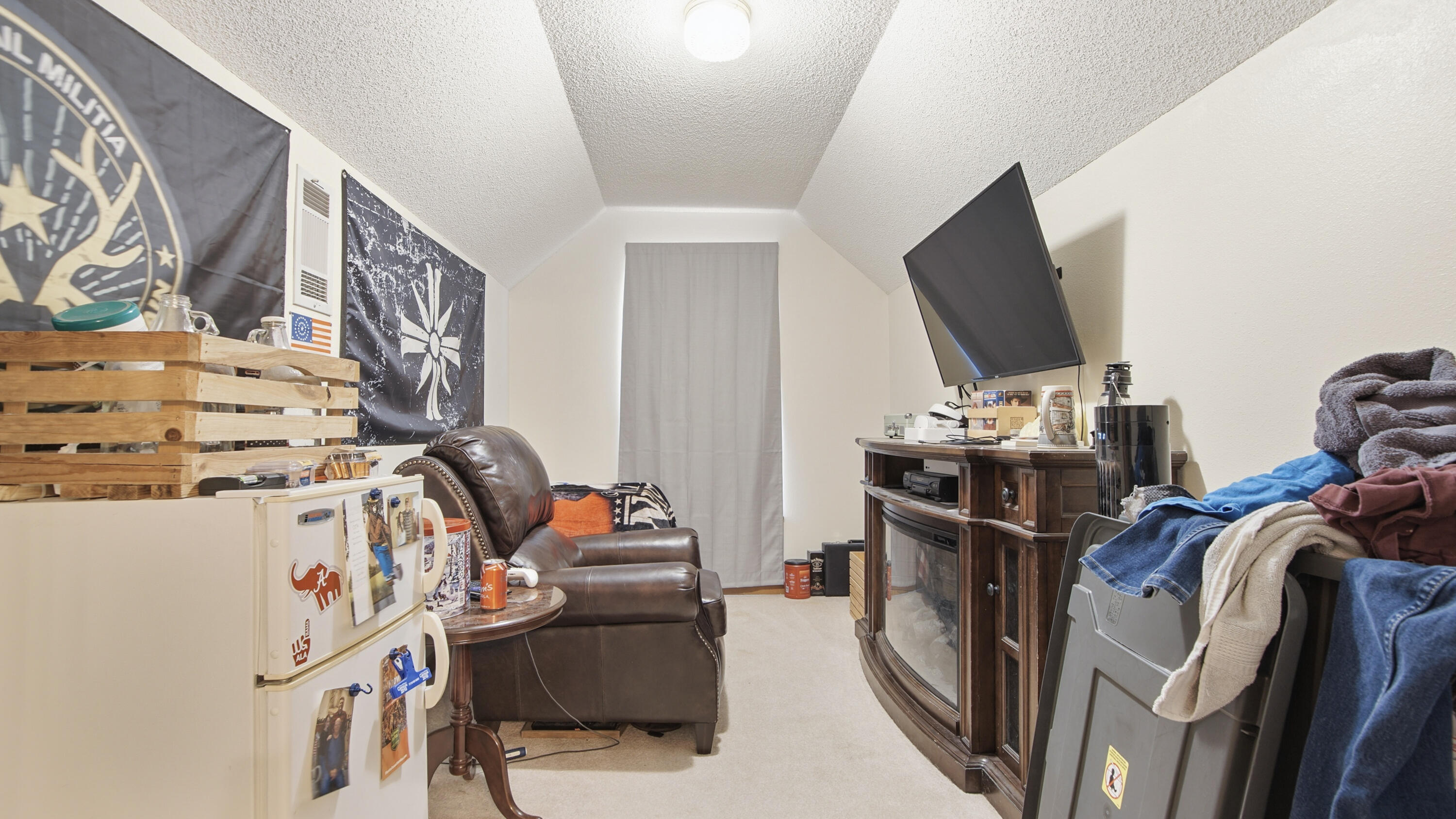 2186 Highway 90 DeFuniak Springs, FL 32433 - Photo 35 of 49 a bedroom with furniture and a flat screen tv