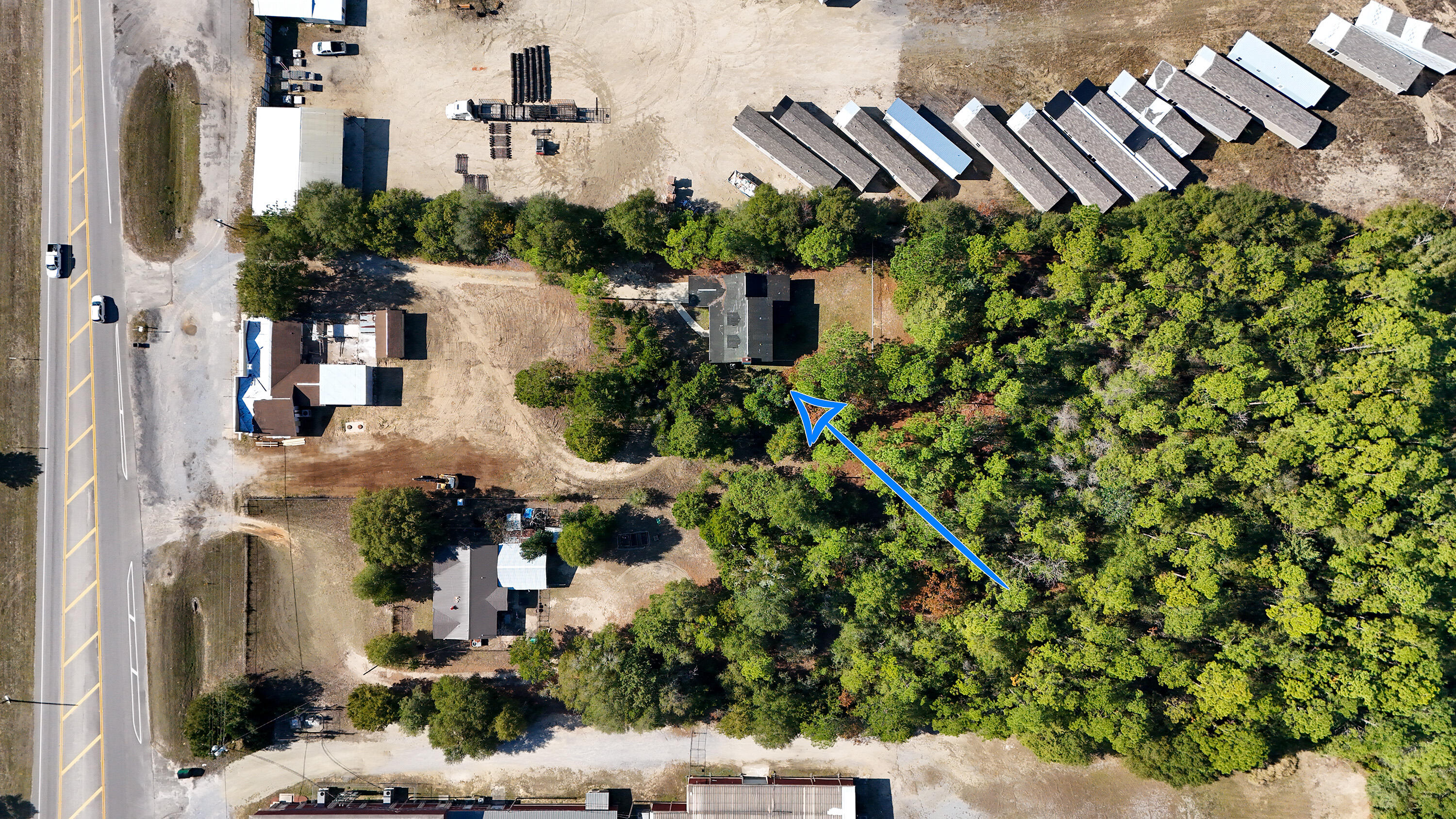 2186 Highway 90 DeFuniak Springs, FL 32433 - Photo 45 of 49 an aerial view of a house with a yard and garden