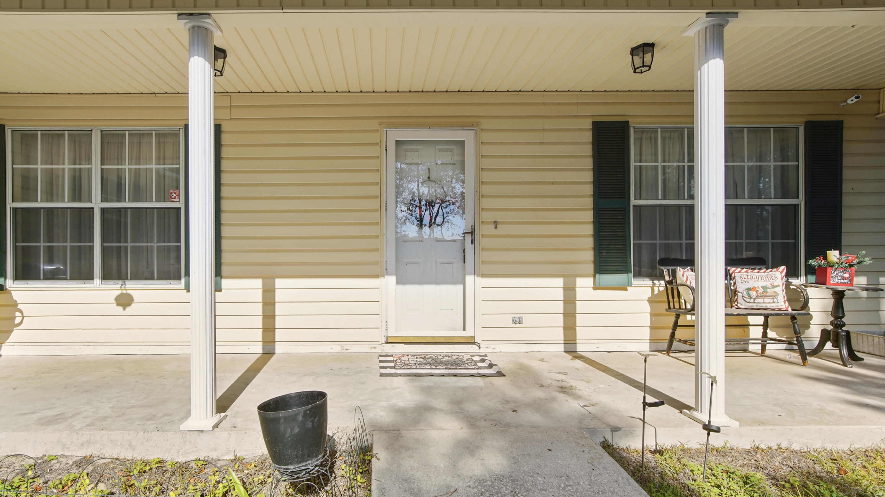 2186 Highway 90 DeFuniak Springs, FL 32433 - Photo 6 of 49 a view of a entryway door front of house