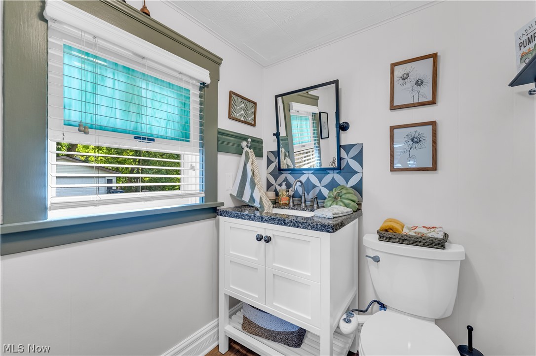 1563 Commodore Road Lyndhurst, OH 44124 - Photo 16 of 37 An additional first floor half bath was recently added with Granite counter top