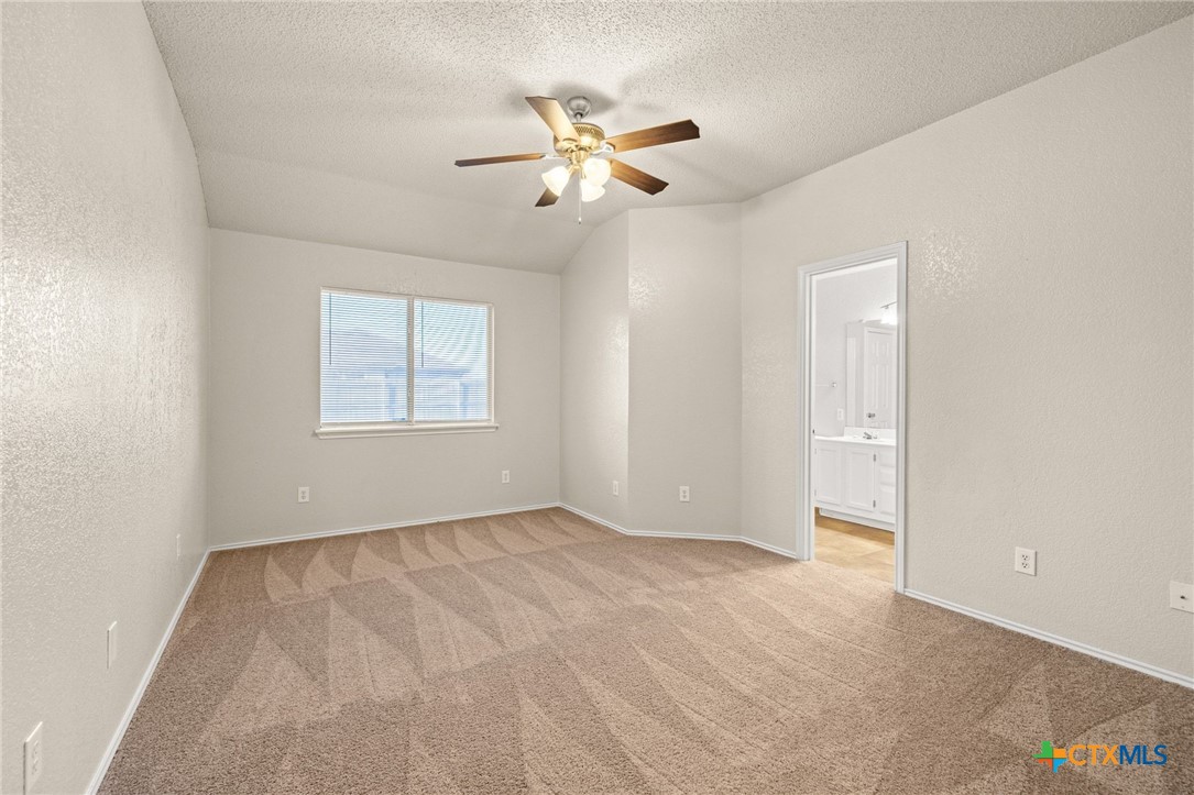 4215 Rifle Drive Killeen, TX 76542 - Photo 15 of 30 an empty room with windows and fan