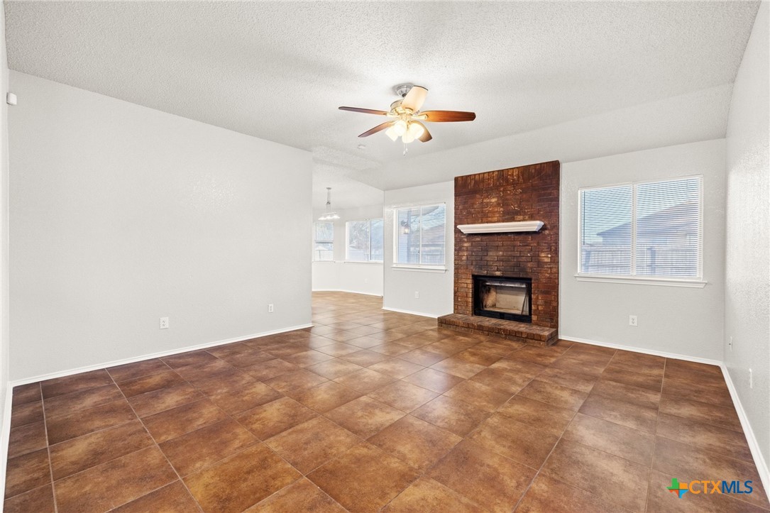 4215 Rifle Drive Killeen, TX 76542 - Photo 6 of 30 a view of empty room with a fireplace