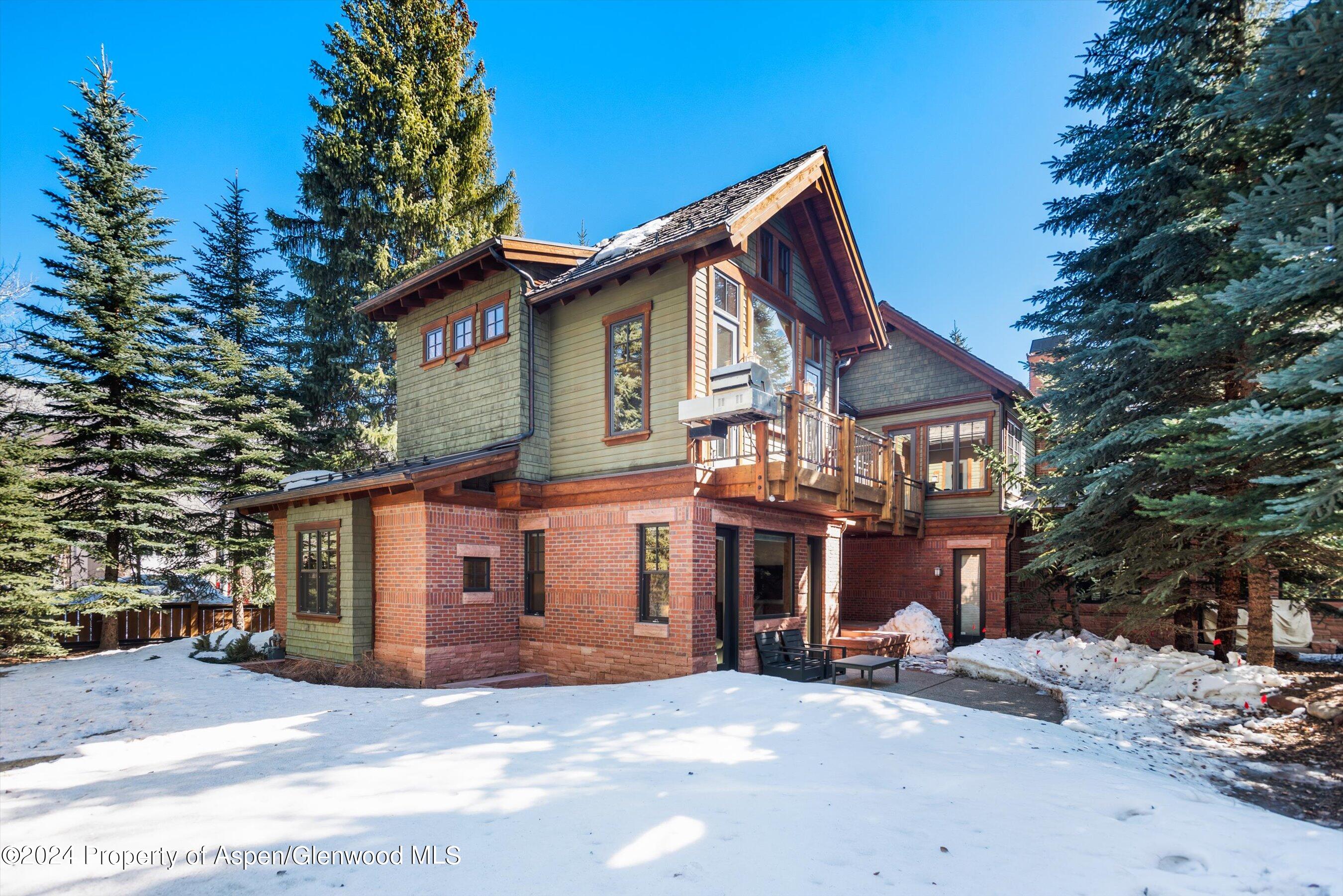 101 South 7th Street, Unit A Aspen, CO 81611 - Photo 11 of 35 a view of a house with a yard and tree s