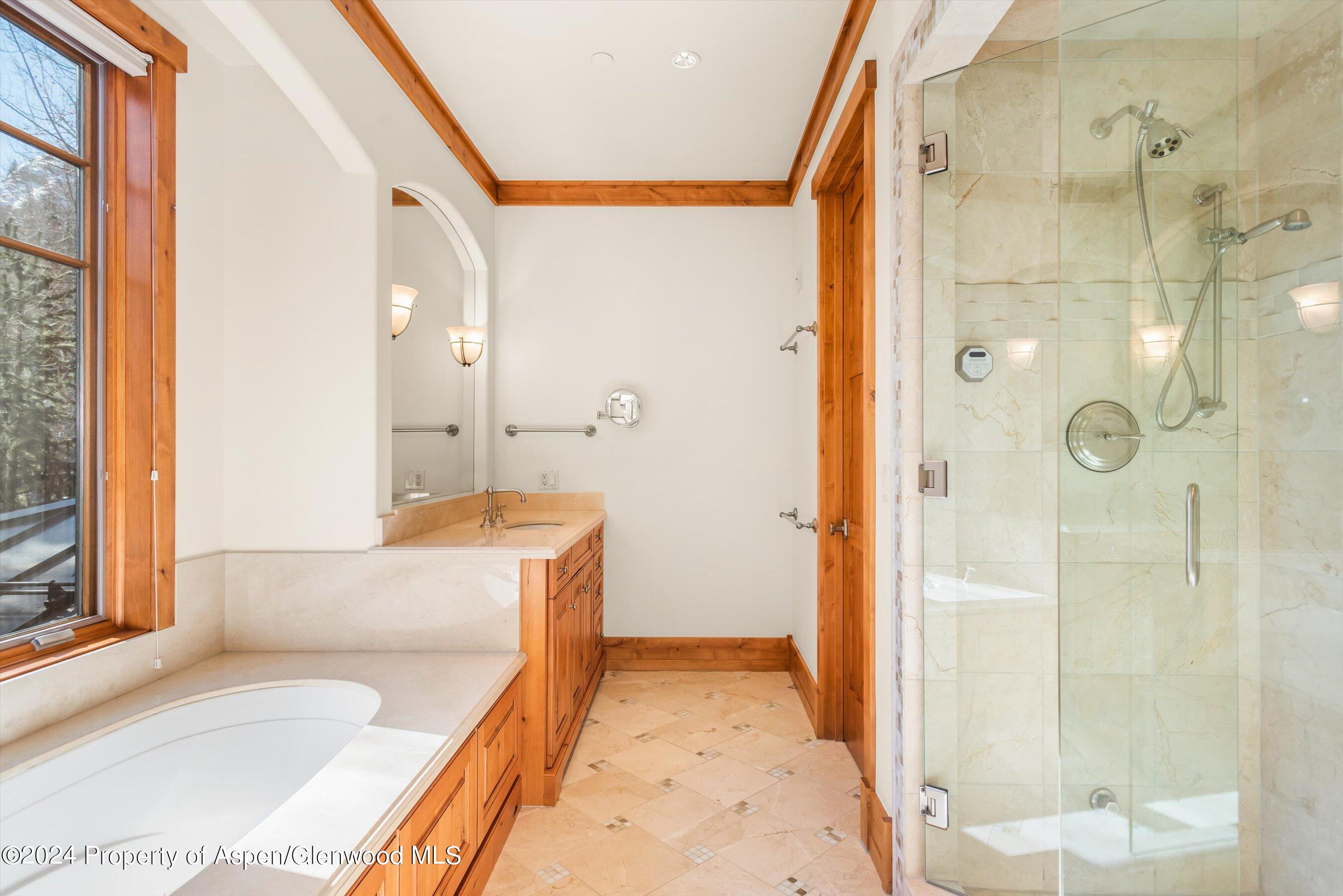 101 South 7th Street, Unit A Aspen, CO 81611 - Photo 25 of 35 a bathroom with a tub sink and shower