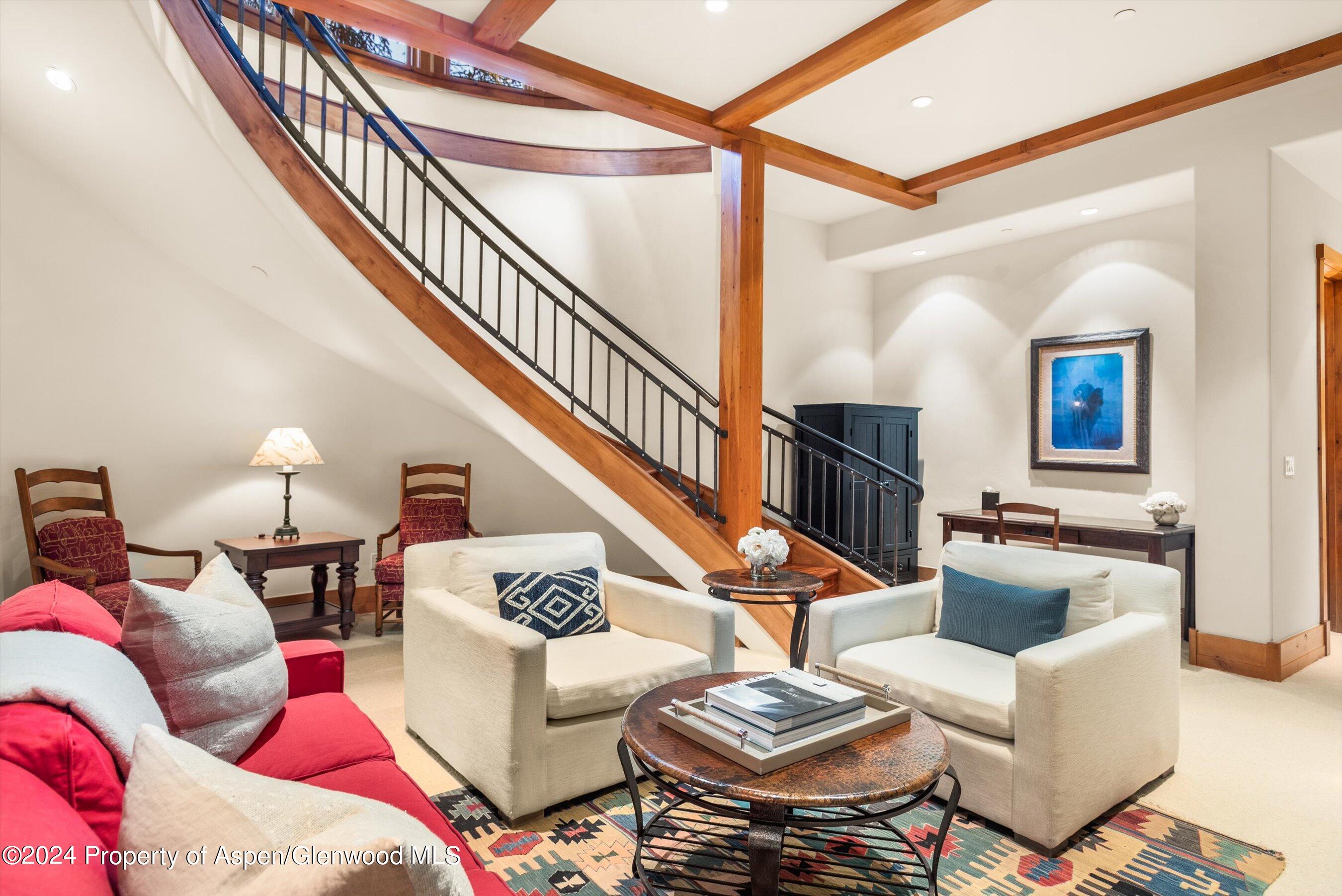 101 South 7th Street, Unit A Aspen, CO 81611 - Photo 27 of 35 a living room with furniture and a ceiling fan