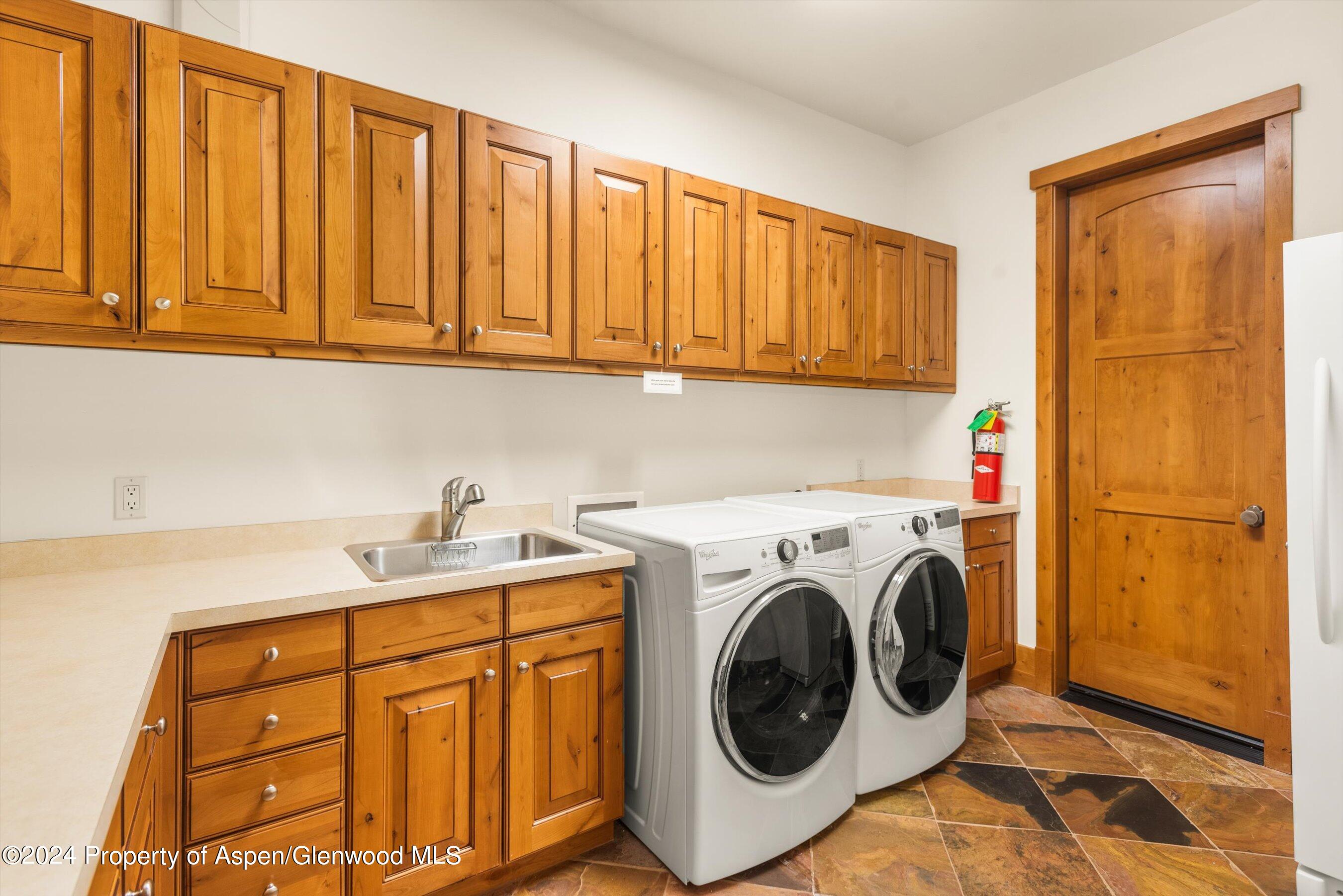 101 South 7th Street, Unit A Aspen, CO 81611 - Photo 35 of 35 a utility room with dryer and washer