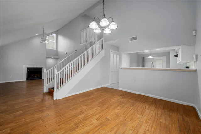 a view of a livingroom with wooden floor