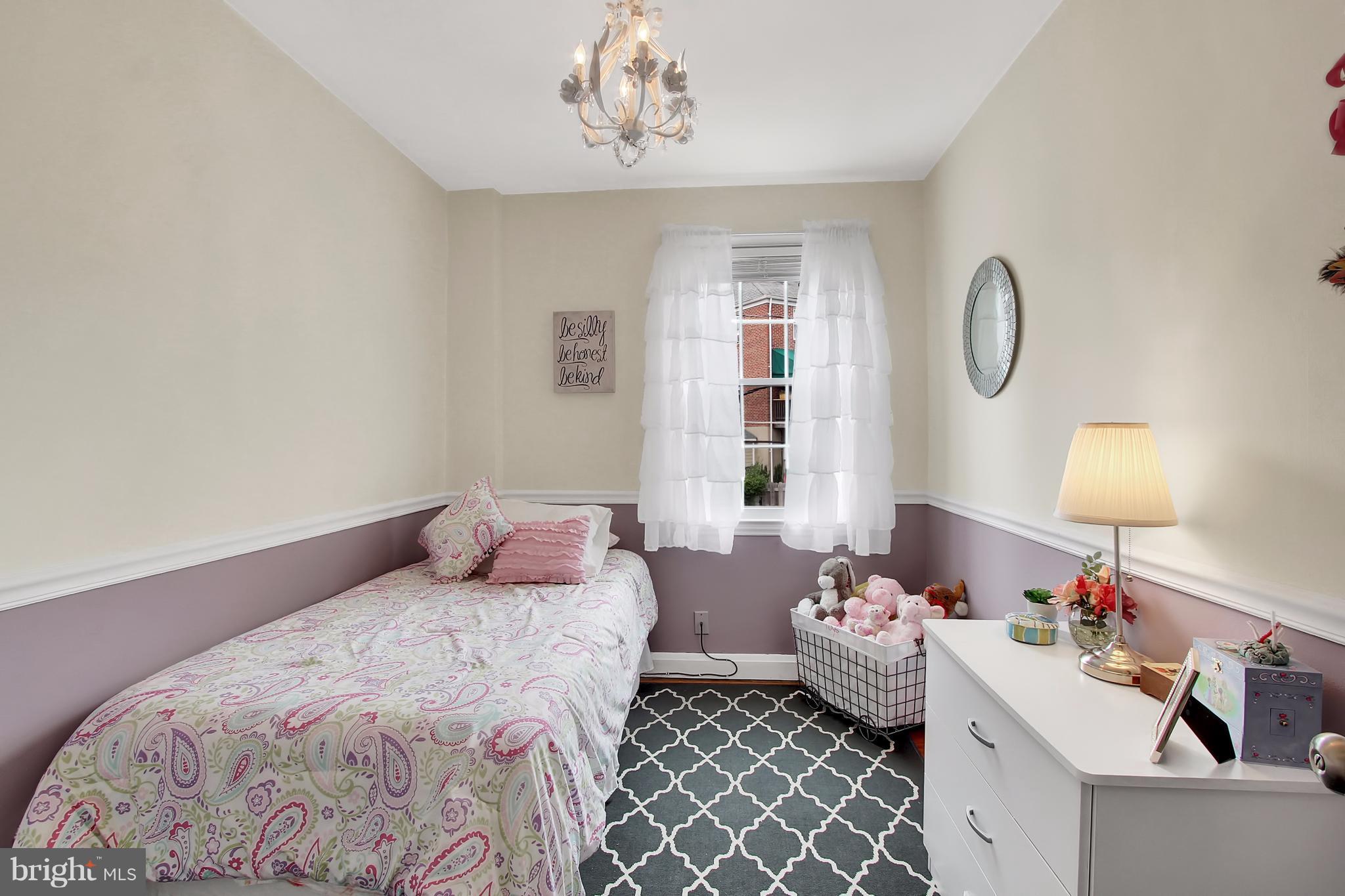 150 Dumbarton Road Baltimore, MD 21212 - Photo 14 of 30 a bedroom with bed and window