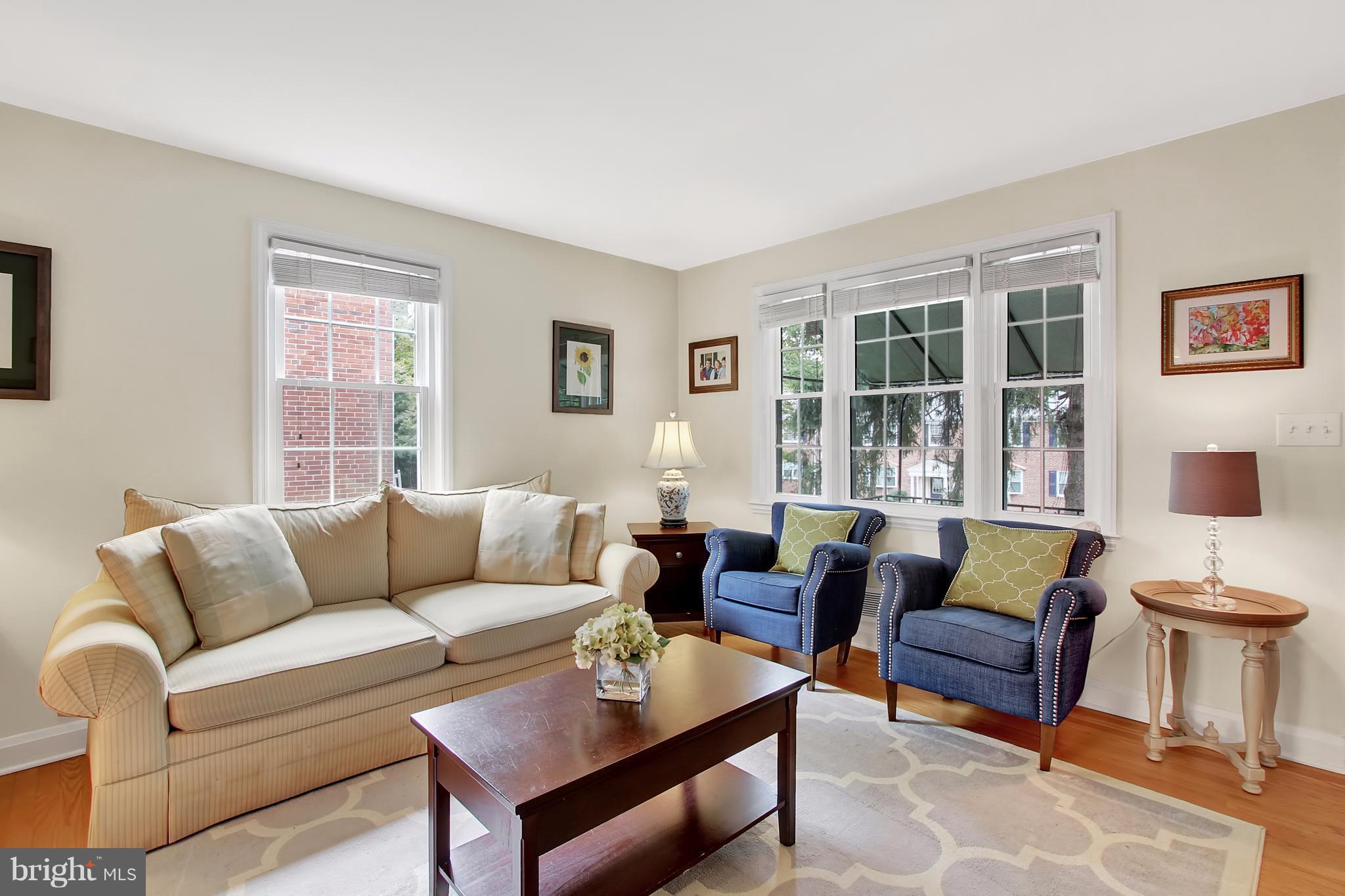 150 Dumbarton Road Baltimore, MD 21212 - Photo 3 of 30 a living room with furniture and a large window