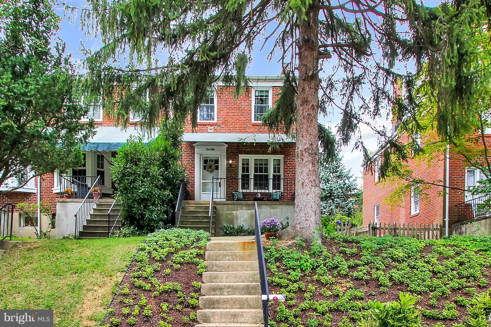 150 Dumbarton Road Baltimore, MD 21212 - Photo 28 of 30 front view of a house with a yard