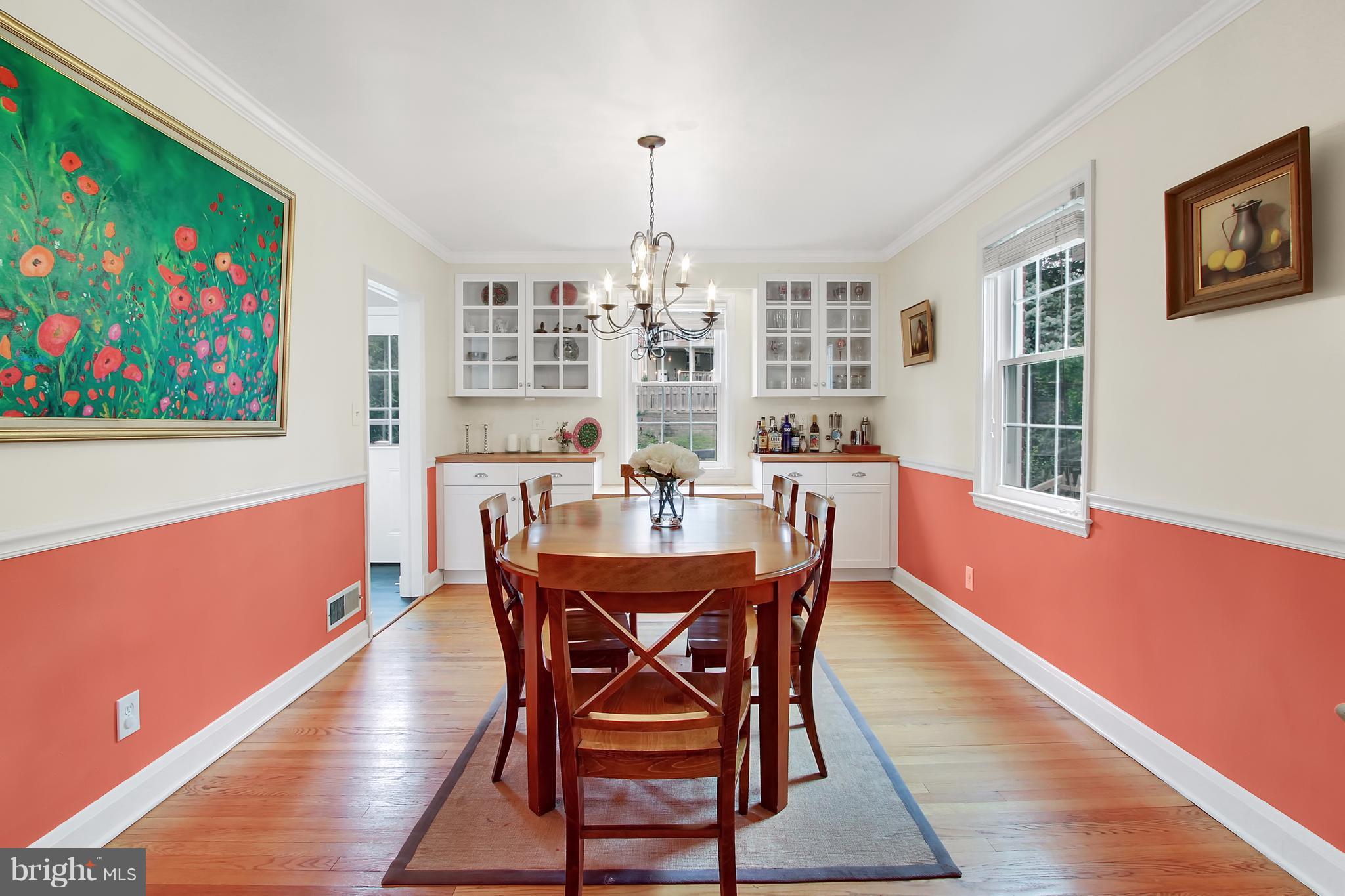 150 Dumbarton Road Baltimore, MD 21212 - Photo 4 of 30 a dining room with furniture a rug and wooden floor