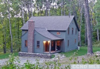 35 Bird Lane Copake, NY 12516 - Photo 2 of 9 front view of a house with a yard