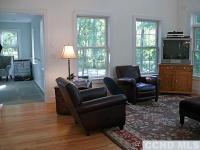 35 Bird Lane Copake, NY 12516 - Photo 5 of 9 a living room with furniture and a flat screen tv