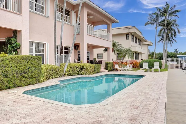 a view of a house with swimming pool