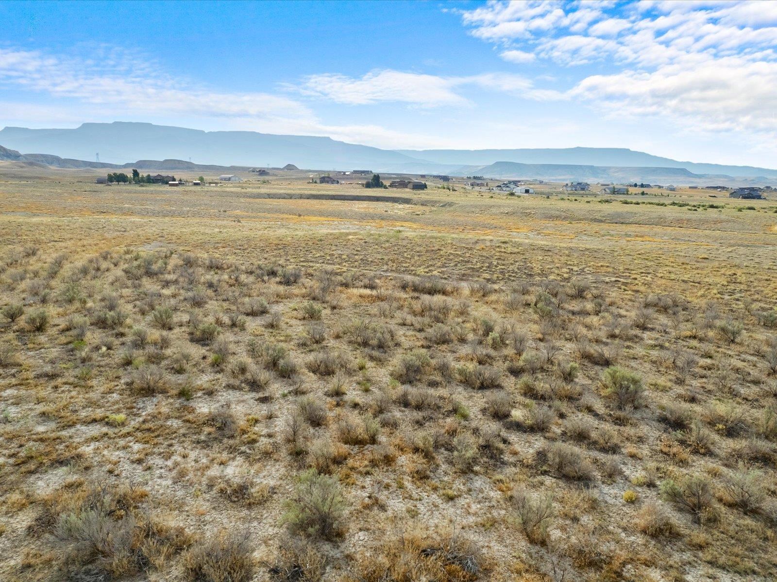 a view of an ocean and a mountain