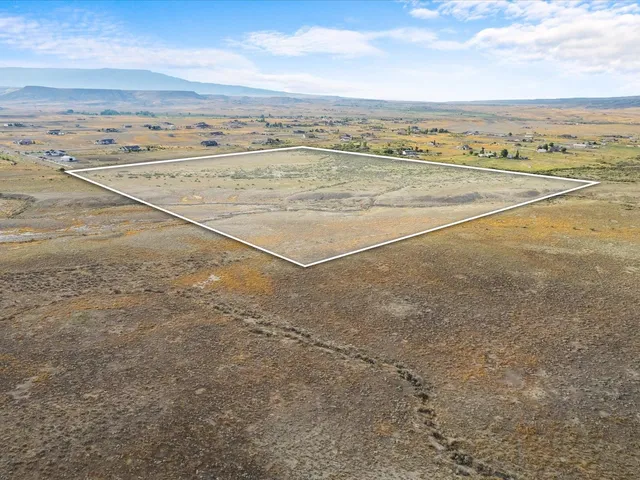 a view of an ocean and a mountain
