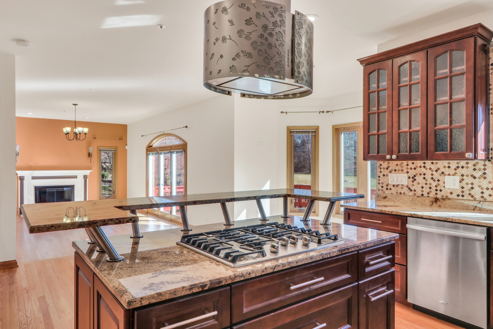 6881 September Boulevard Long Grove, IL 60047 - Photo 18 of 64 a view of a kitchen area with furniture and fireplace