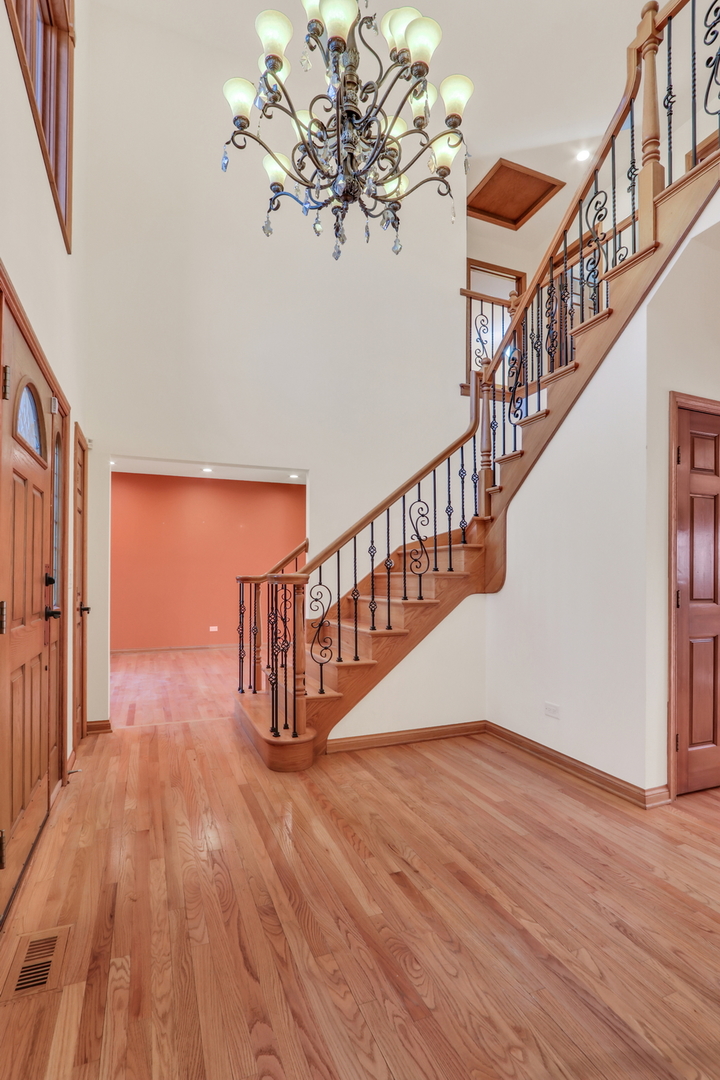 6881 September Boulevard Long Grove, IL 60047 - Photo 3 of 64 a view of entryway with wooden floor