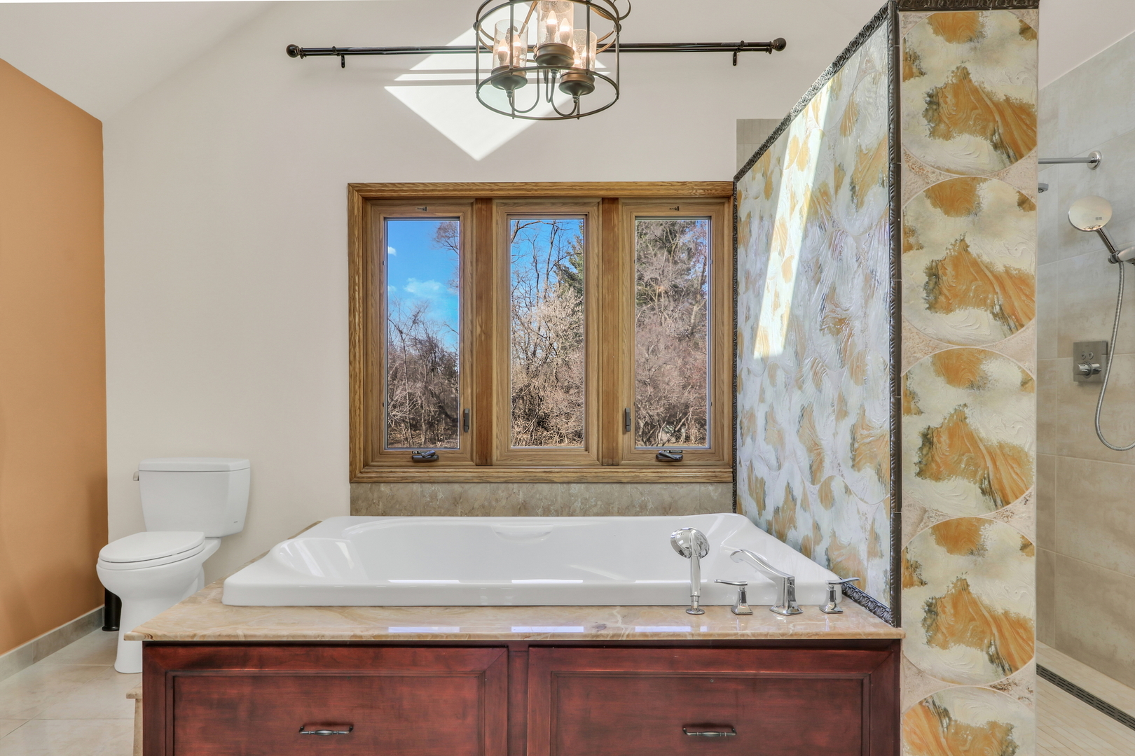 6881 September Boulevard Long Grove, IL 60047 - Photo 32 of 64 a bathroom with a bathtub and shower