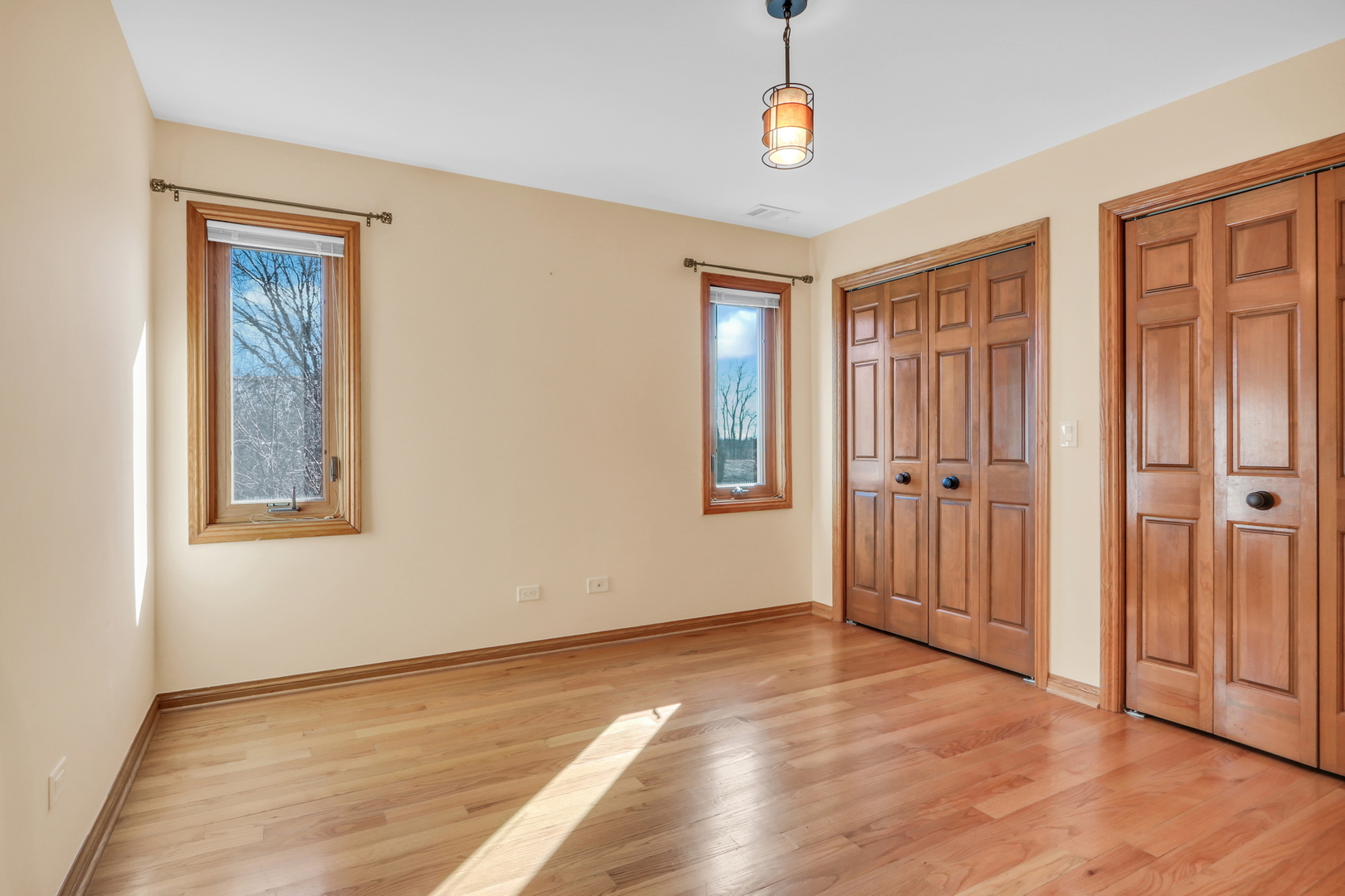 6881 September Boulevard Long Grove, IL 60047 - Photo 36 of 64 wooden floor in an empty room with a window