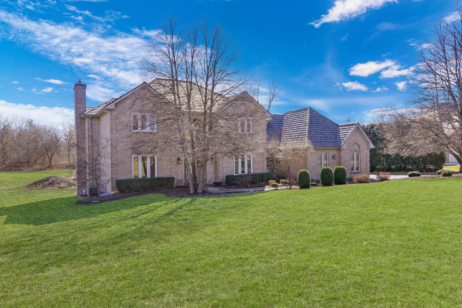 6881 September Boulevard Long Grove, IL 60047 - Photo 48 of 64 a view of a house with a big yard