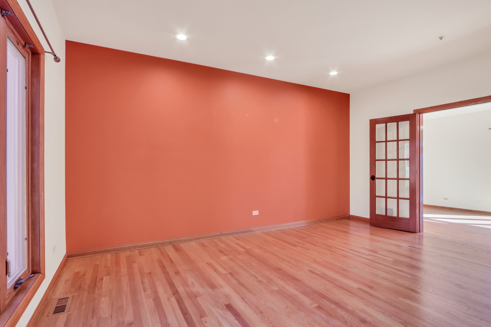 6881 September Boulevard Long Grove, IL 60047 - Photo 5 of 64 a view of an empty room with wooden floor and closet