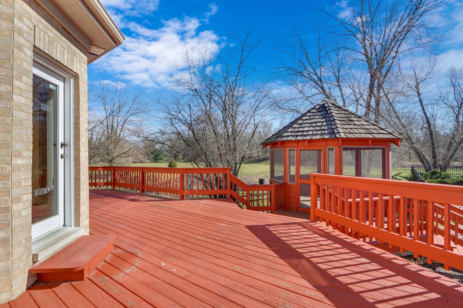 6881 September Boulevard Long Grove, IL 60047 - Photo 60 of 64 a view of a house with wooden deck