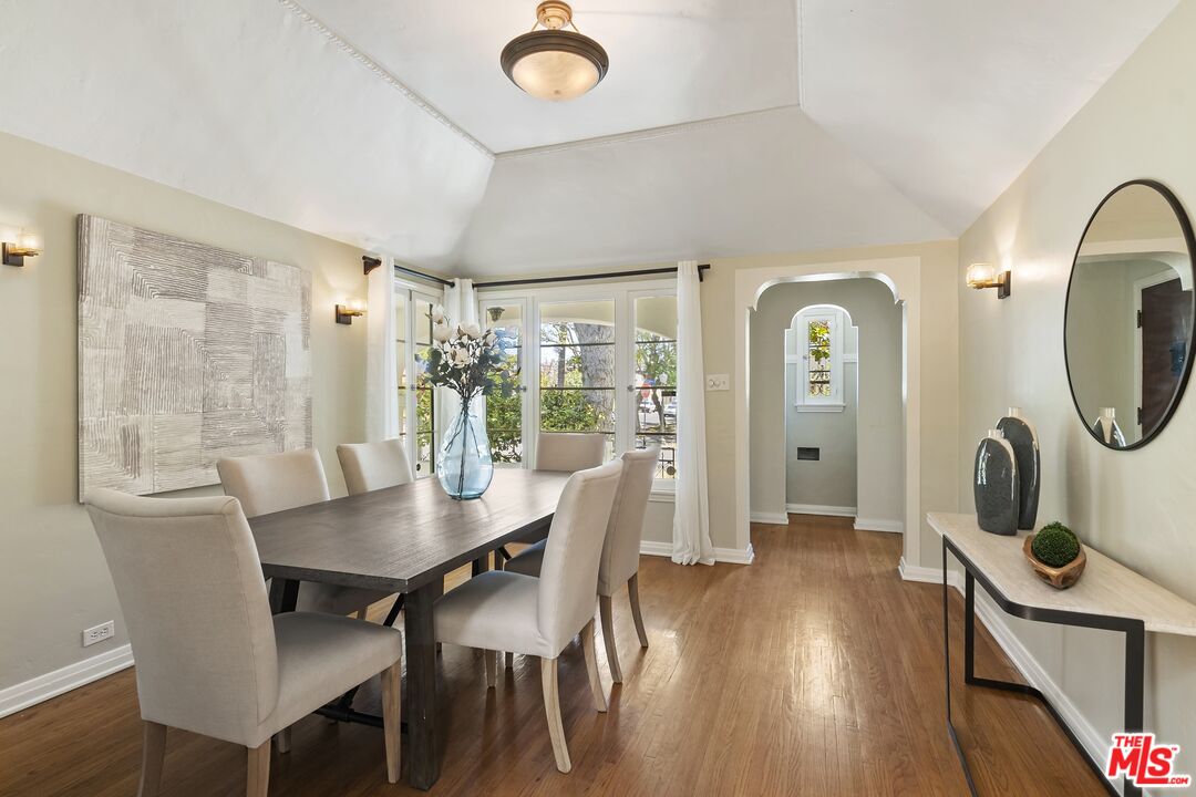 2303 Midvale Avenue Los Angeles, CA 90064 - Photo 11 of 38 a view of a dining room with furniture window and wooden floor