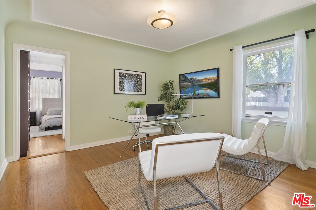 2303 Midvale Avenue Los Angeles, CA 90064 - Photo 17 of 38 a workspace room with wooden floor and windows