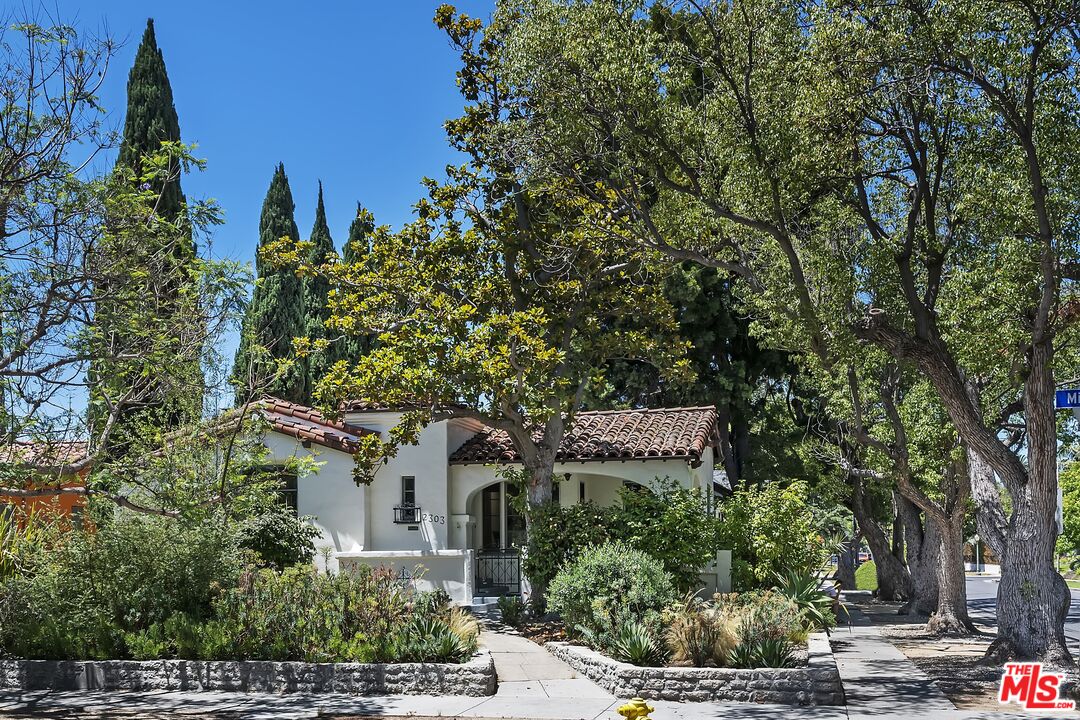 2303 Midvale Avenue Los Angeles, CA 90064 - Photo 2 of 38 a view of a house with a tree