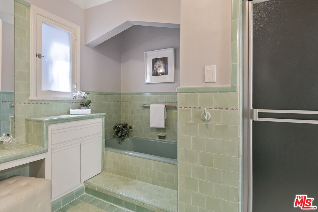 2303 Midvale Avenue Los Angeles, CA 90064 - Photo 26 of 38 a bathroom with a sink a toilet and shower
