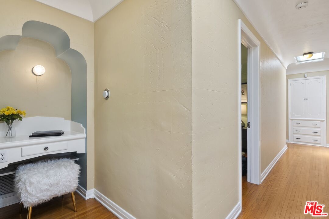 2303 Midvale Avenue Los Angeles, CA 90064 - Photo 27 of 38 a view of a hallway with furniture and wooden floor