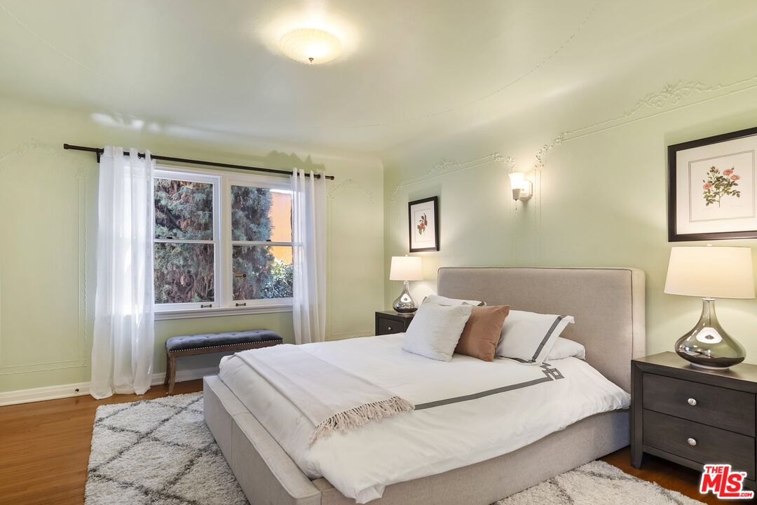 2303 Midvale Avenue Los Angeles, CA 90064 - Photo 28 of 38 a bedroom with a bed and window