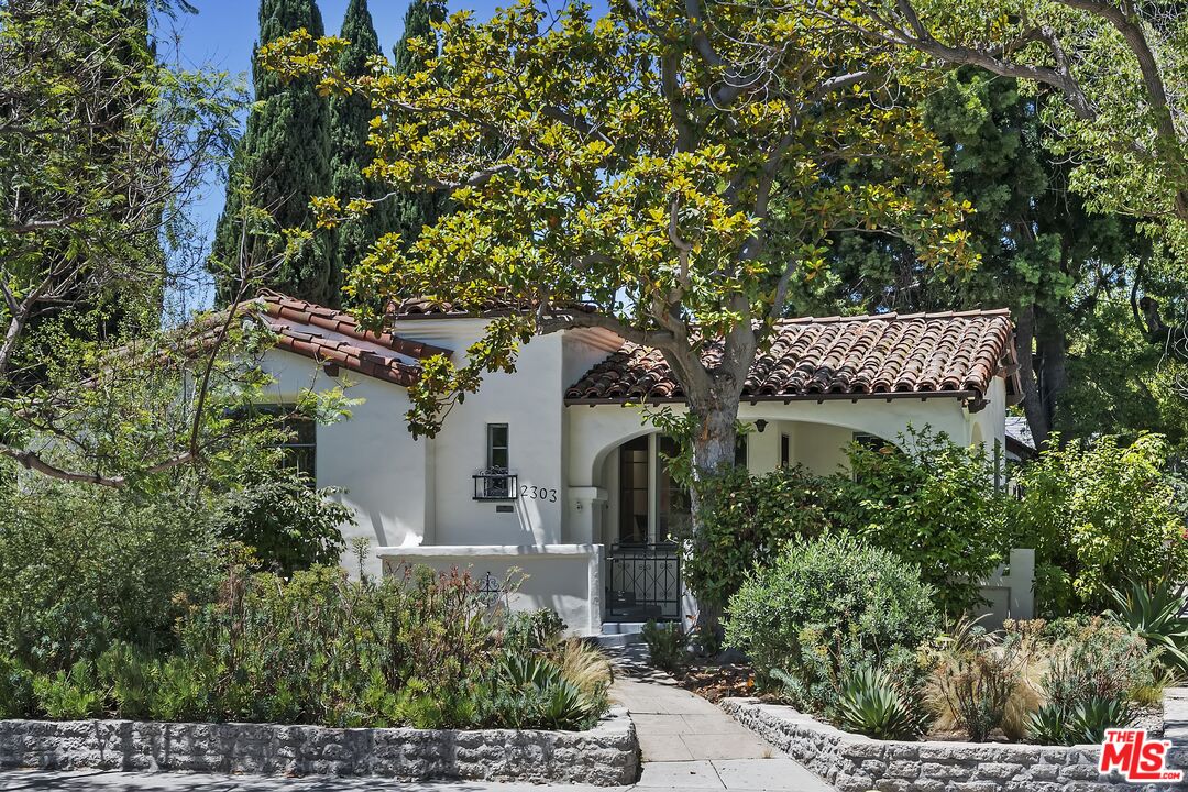 2303 Midvale Avenue Los Angeles, CA 90064 - Photo 3 of 38 a view of a house with a tree