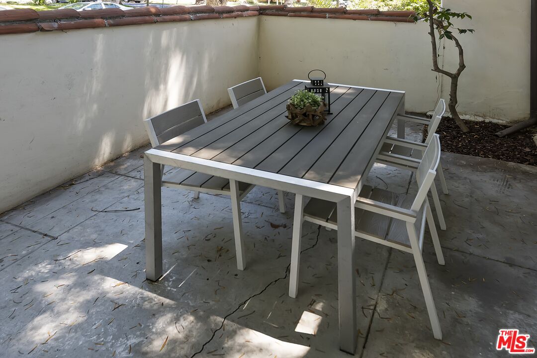 2303 Midvale Avenue Los Angeles, CA 90064 - Photo 36 of 38 a view of balcony with chair and potted plant