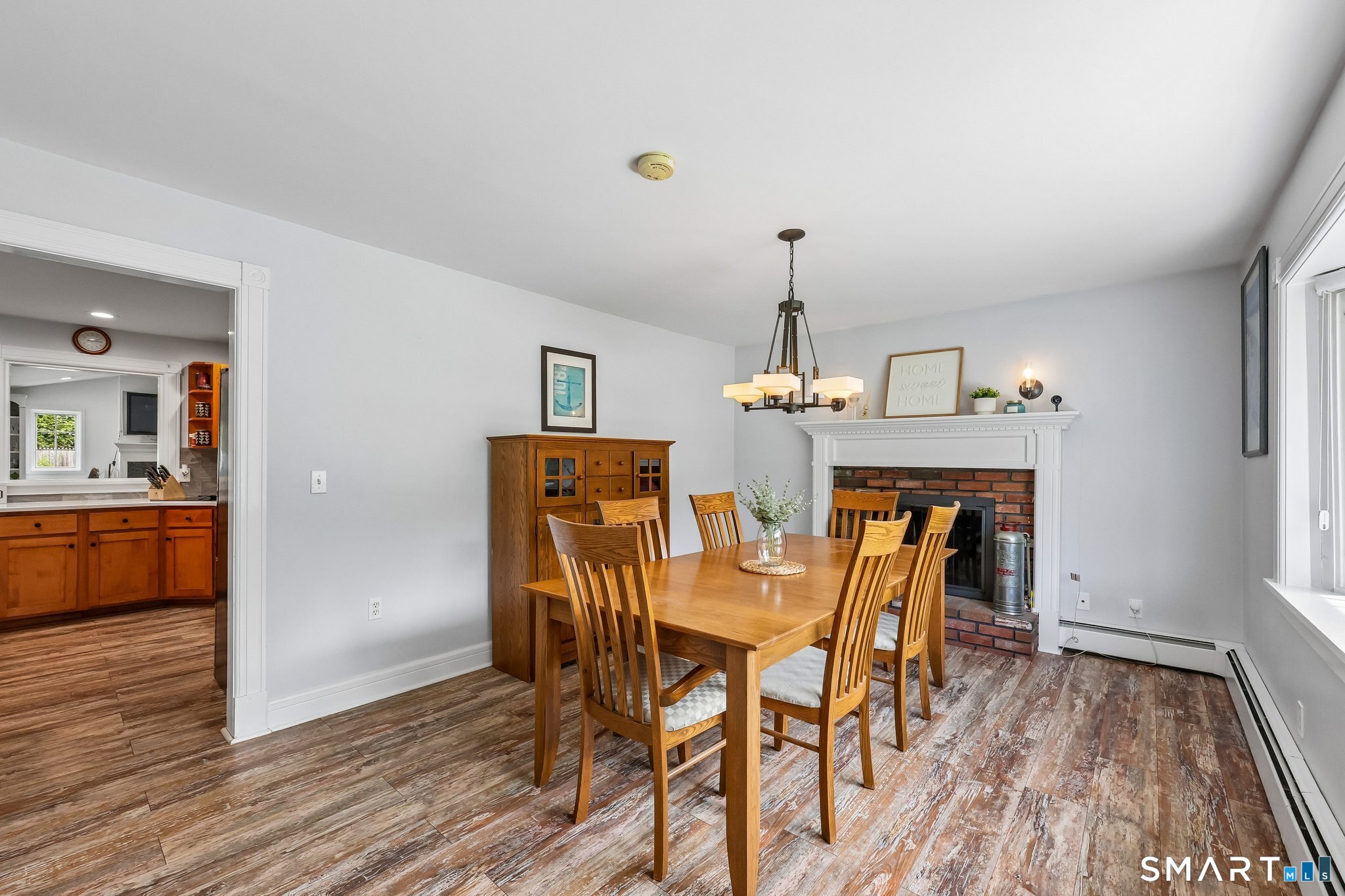 21 Friendly Road Norwalk, CT 06851 - Photo 11 of 28 A dining room should encompass warmth, light, space - this dining room has it ALL!! Fireplace, bay window and plenty of room for a large dining table to gather family and friends!