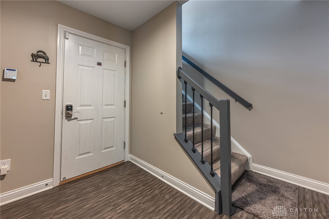 407 Brownstone Row Springboro, OH 45066 - Photo 39 of 54 This inviting entrance features durable flooring and a stairway leading to upper levels.