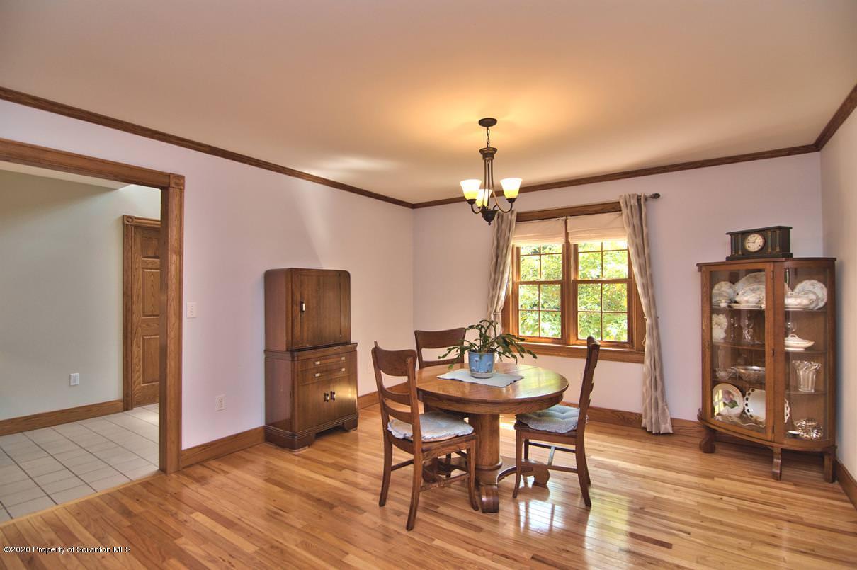 353 Ridge Road Wyoming, PA 18644 - Photo 11 of 157 a view of a dining room with furniture and window
