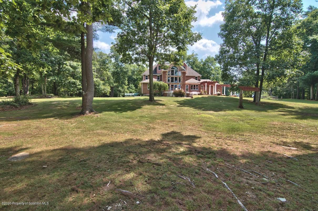 353 Ridge Road Wyoming, PA 18644 - Photo 115 of 157 a front view of a house with a yard