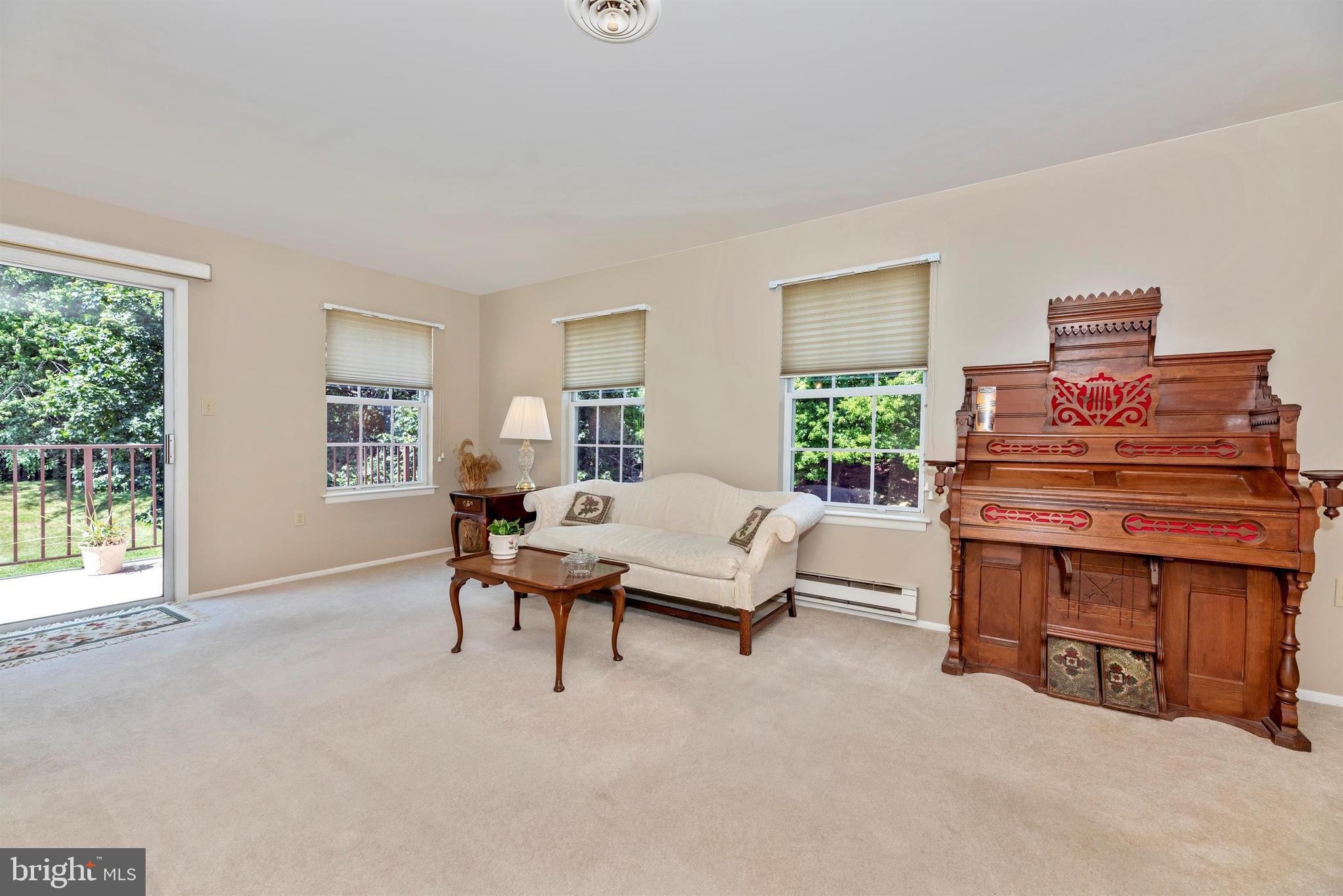 7046 Basswood Road, Unit 11 Frederick, MD 21703 - Photo 10 of 55 Living room opens to your deck