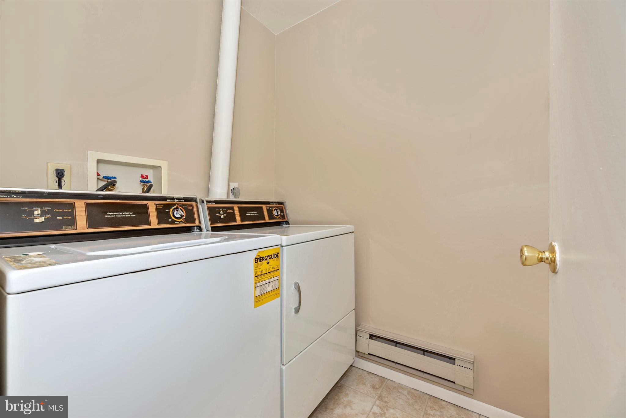 7046 Basswood Road, Unit 11 Frederick, MD 21703 - Photo 31 of 55 Separate laundry room w/new floor