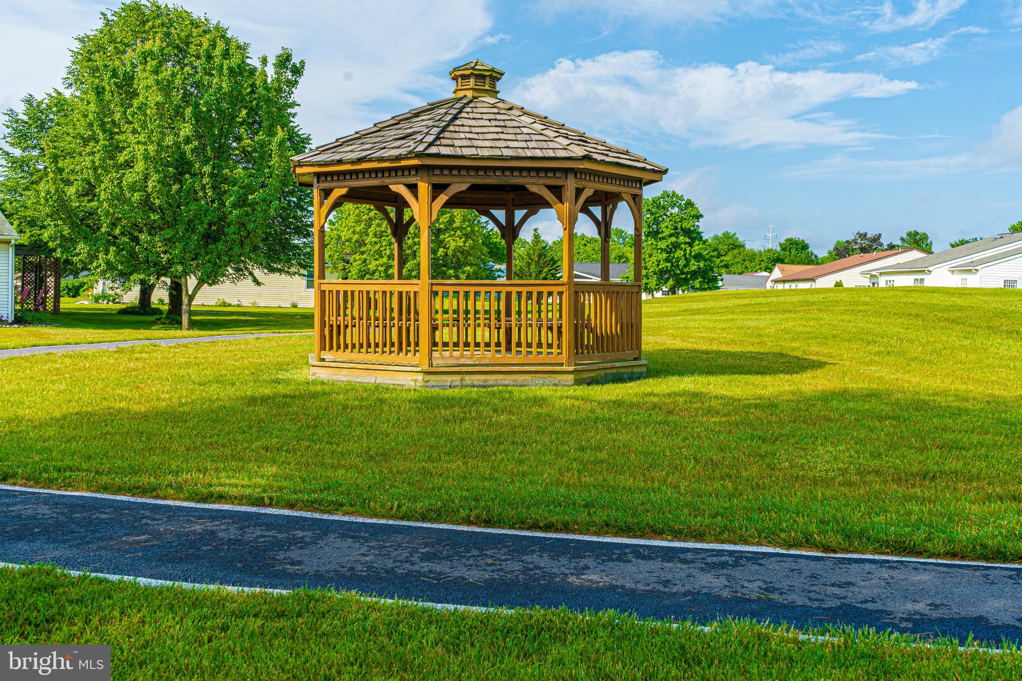 7046 Basswood Road, Unit 11 Frederick, MD 21703 - Photo 52 of 55 Need a break on your walk? Gazebo with seats