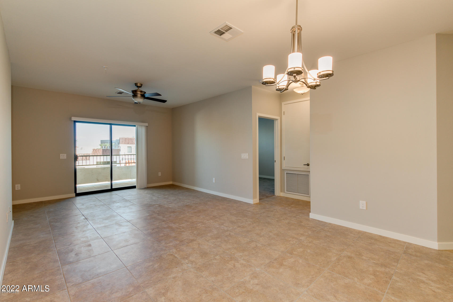 2511 West Queen Creek Road, Unit 238 Chandler, AZ 85248 - Photo 16 of 22 a view of a chandelier fan and entryway