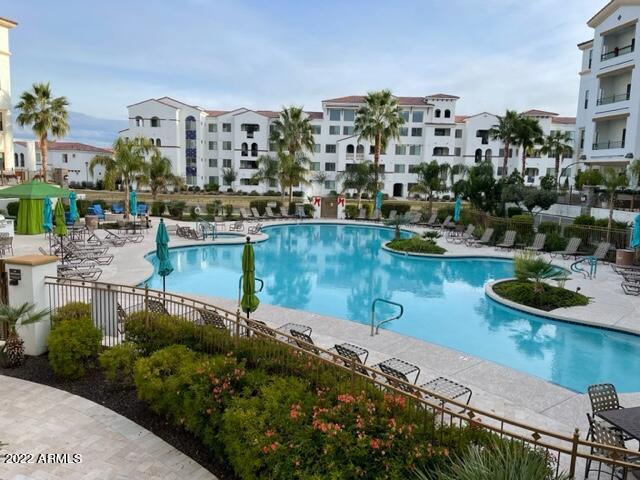 2511 West Queen Creek Road, Unit 238 Chandler, AZ 85248 - Photo 2 of 22 a view of a lake with a city