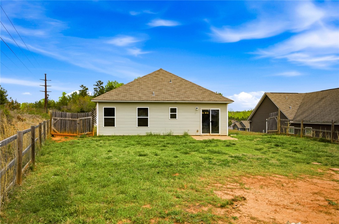 245 Maple Grove Road Seneca, SC 29678 - Photo 34 of 40 This residence features a spacious backyard, perfect for outdoor activities and relaxation.