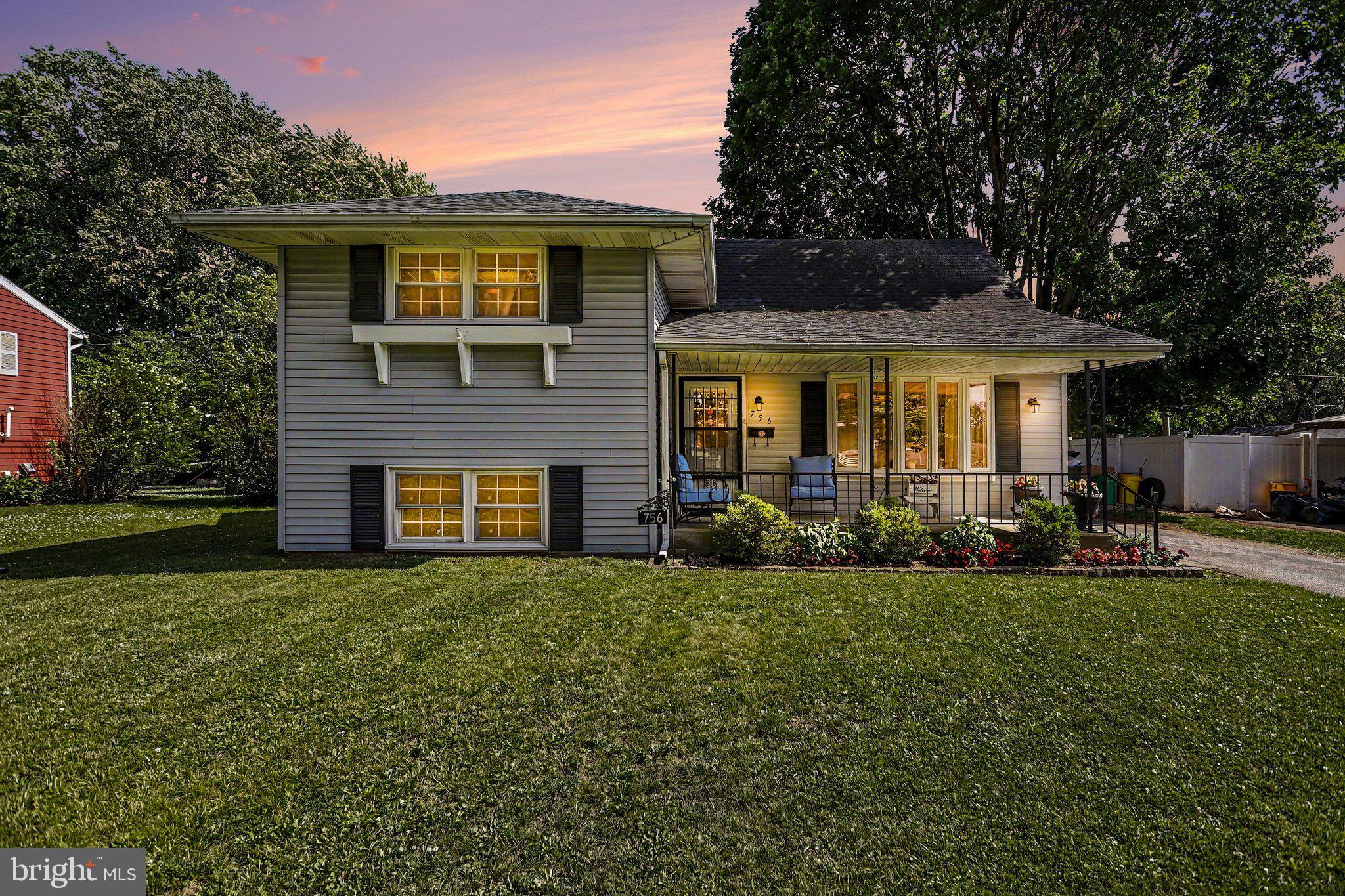 756 Fireside Road York, PA 17404 - Photo 1 of 29 Charming home with lush green lawn.