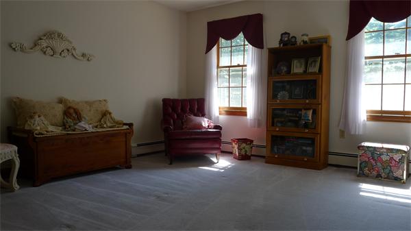20 Willow Road Boxford, MA 01921 - Photo 12 of 15 a living room with furniture and a window