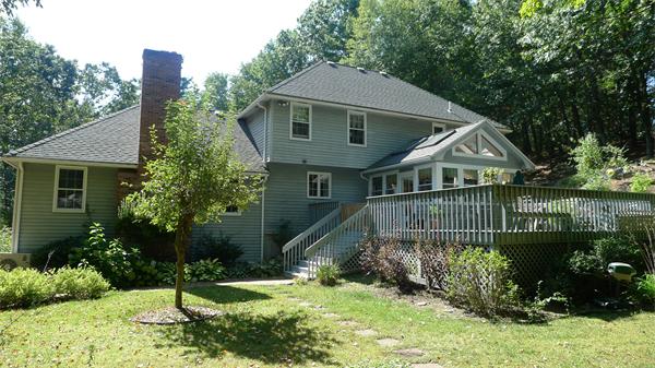 20 Willow Road Boxford, MA 01921 - Photo 2 of 15 a front view of a house with a yard