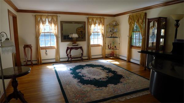 20 Willow Road Boxford, MA 01921 - Photo 9 of 15 a living room with furniture rug and wooden floor